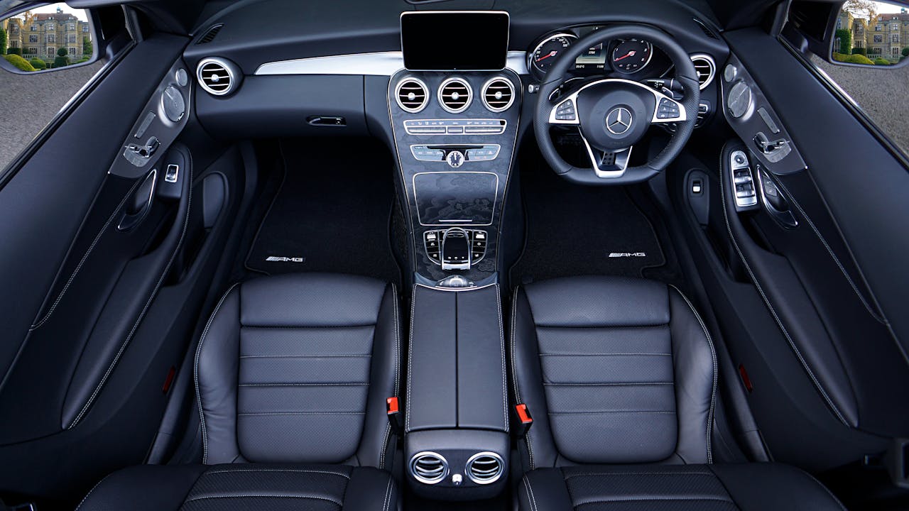 gallery-5 Explore a sleek and stylish Mercedes interior with premium leather seats and sophisticated dashboard.